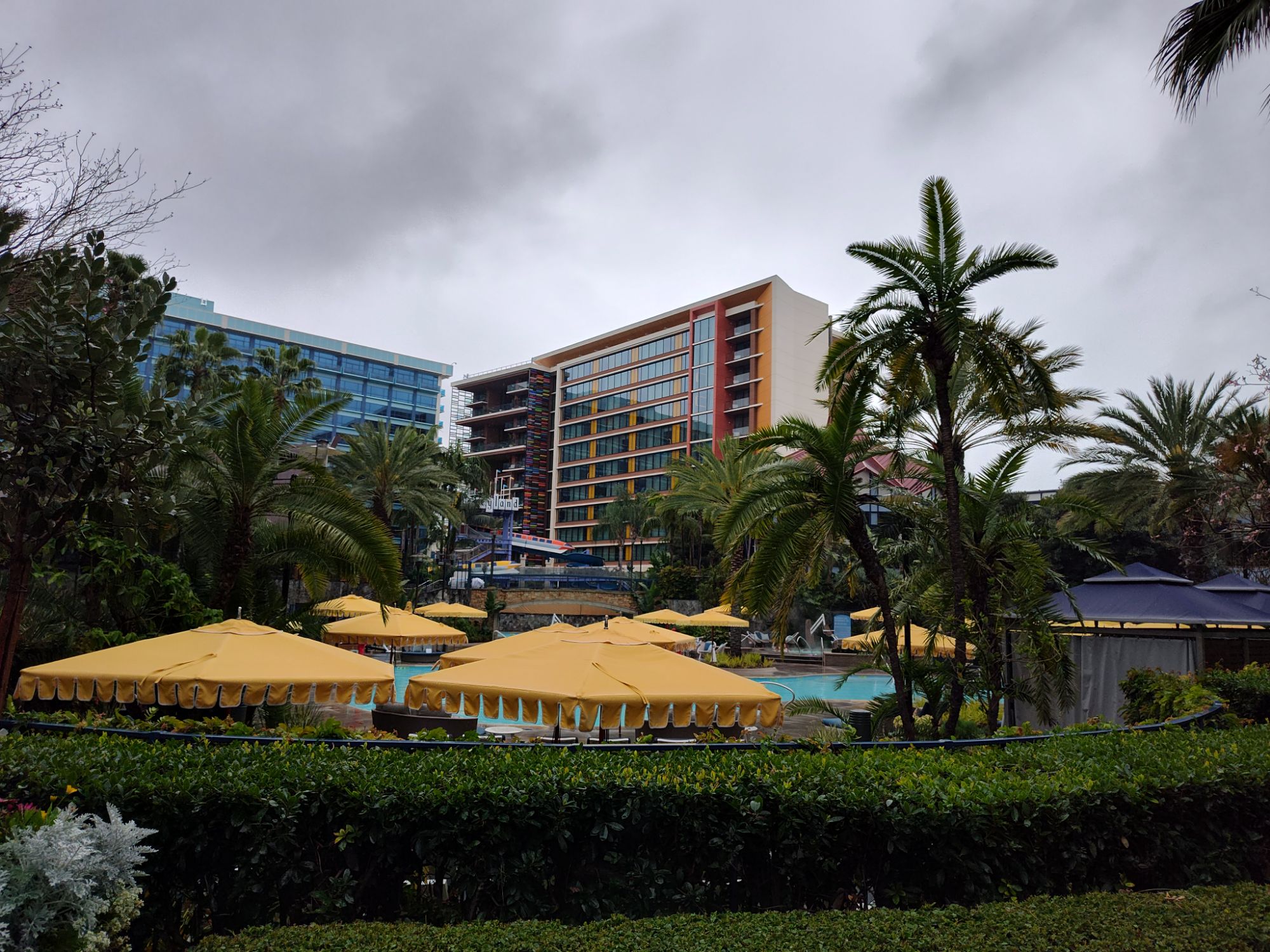 The resort is beautiful, but there's not too many people outside because it's rather cloudy and threatening to pour down rain.